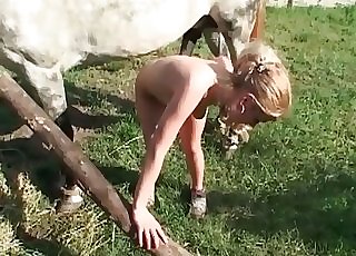 Blonde banged from behind by horse